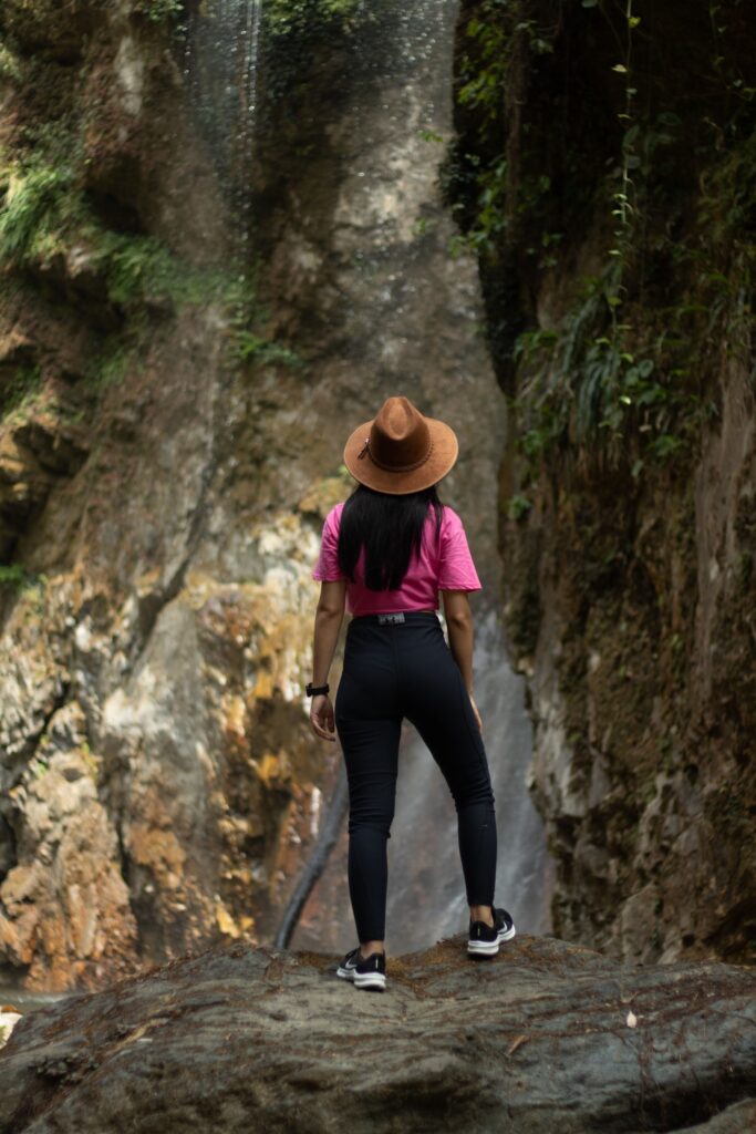 Waterfall girl in the Jarabacoa, Dominican Republic